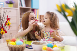 a girl and her teacher playing